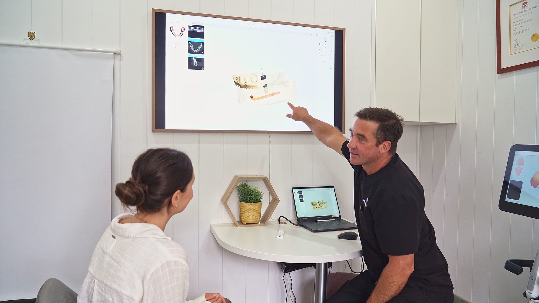 woman picking out tooth color shade | teeth whitening alstonville